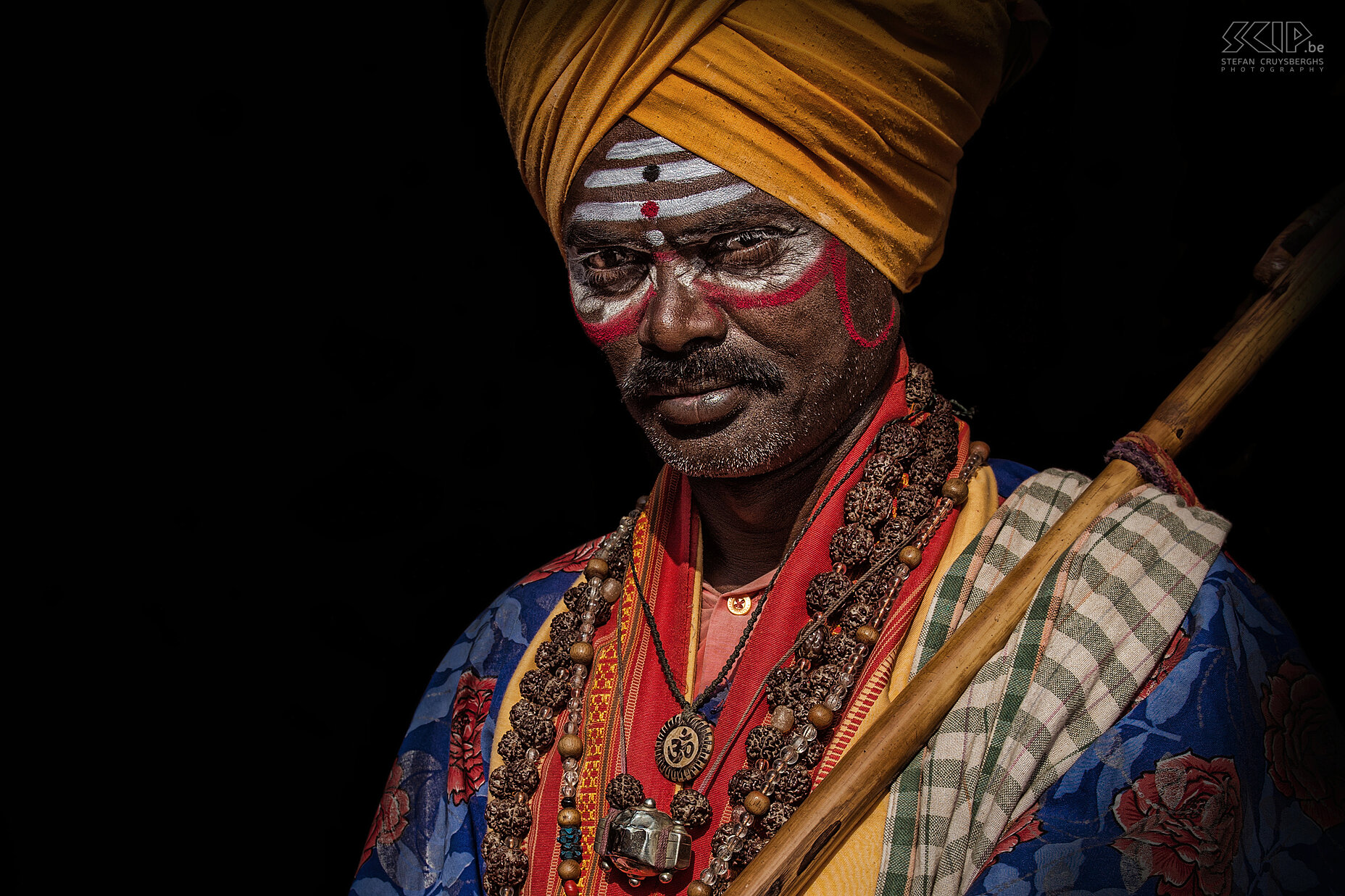 Hampi - Sadhu Portrait of a turban clad sadhu in Hampi. These 'holy men' have left behind all material attachments and live from donations from tourists and local Hindoes. Stefan Cruysberghs